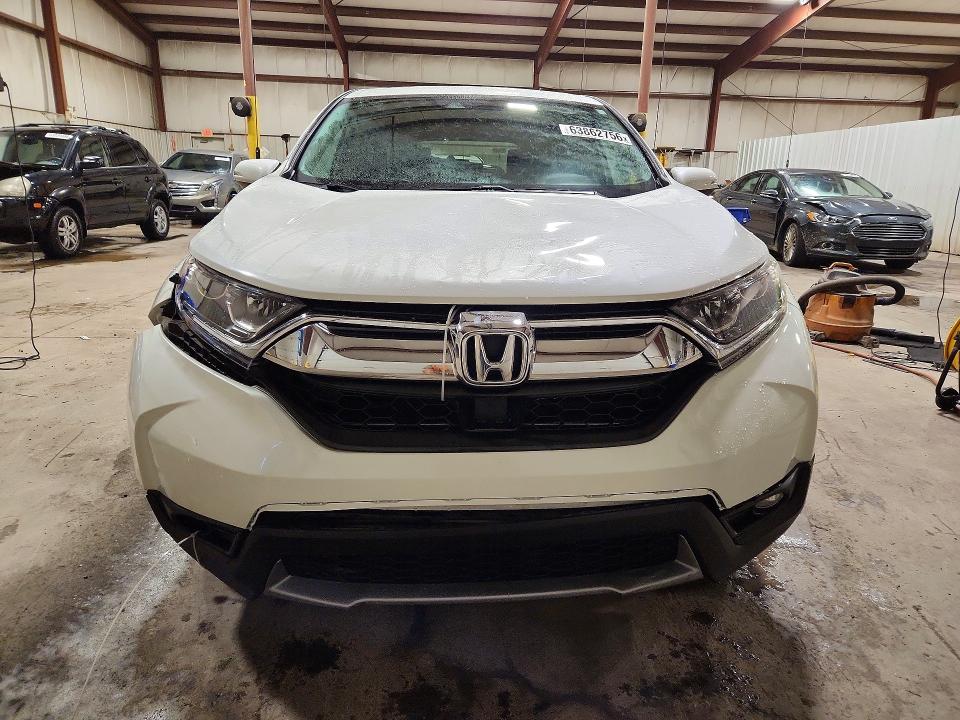 Photo 5 from auction – 2017 HONDA CR-V with VIN 5J6RW2H5XHL041824