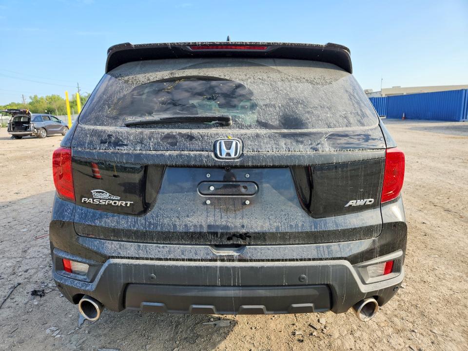 Photo 6 from auction – 2023 HONDA PASSPORT with VIN 5FNYF8H52PB039913