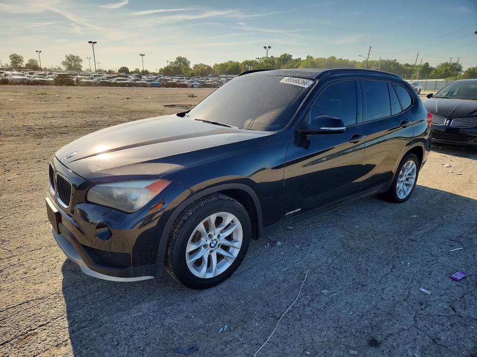 BMW X1 2015 with VIN WBAVL1C55FVY30718 - Photo from auction