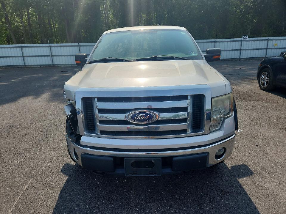 Photo 5 from auction – 2011 FORD F150 with VIN 1FTVX1EF8BKD18394