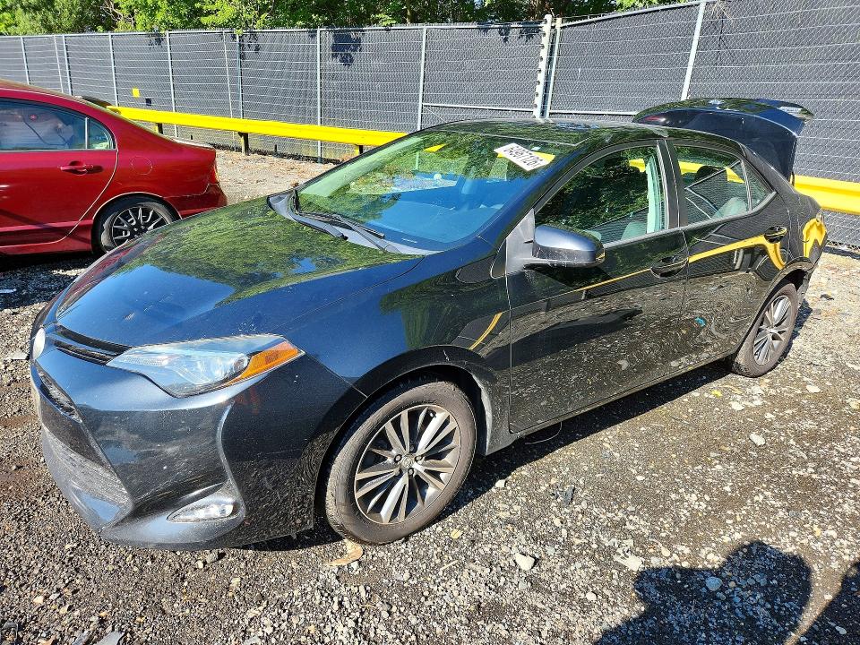 TOYOTA COROLLA 2018 with VIN 2T1BURHEXJC113964 - Photo from auction