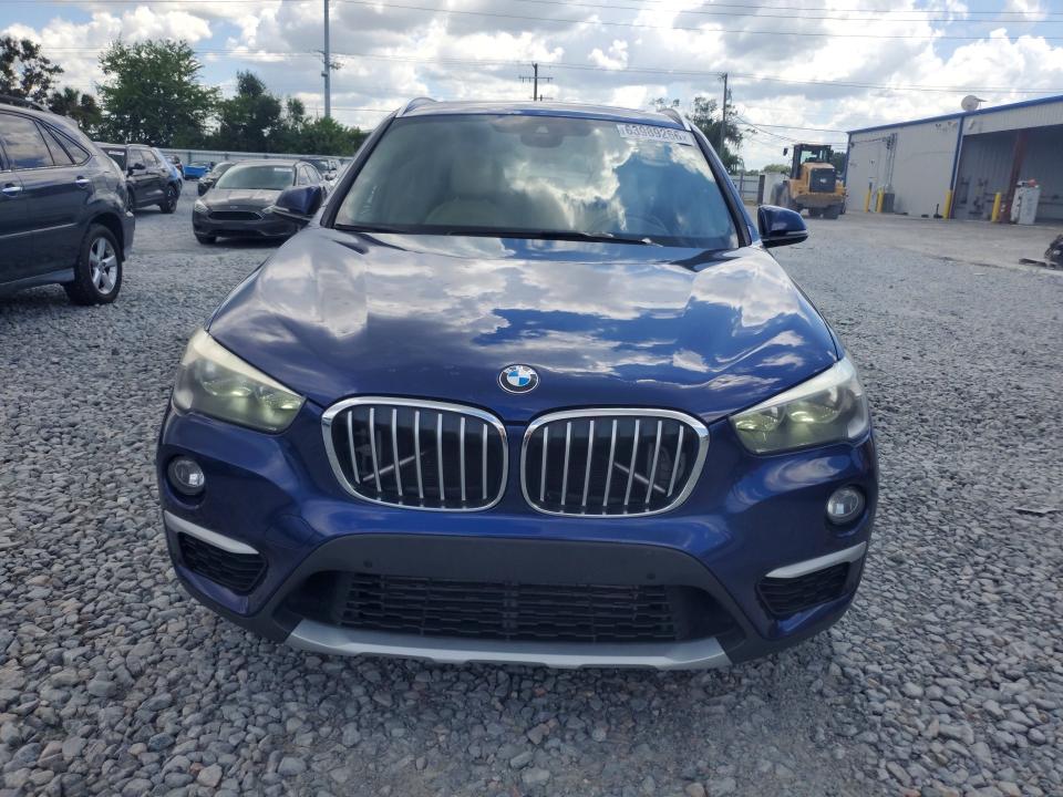 Photo 5 from auction – 2017 BMW X1 with VIN WBXHT3C33H5F69771