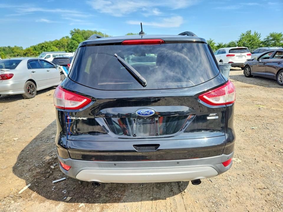 Photo 6 from auction – 2016 FORD ESCAPE with VIN 1FMCU9GX8GUA96161