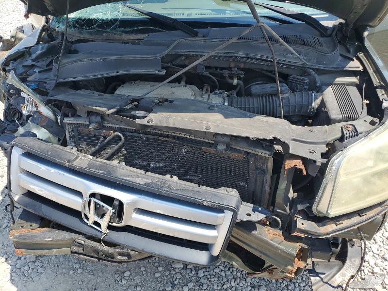 Photo 12 from auction – 2006 HONDA PILOT with VIN 2HKYF18496H507909