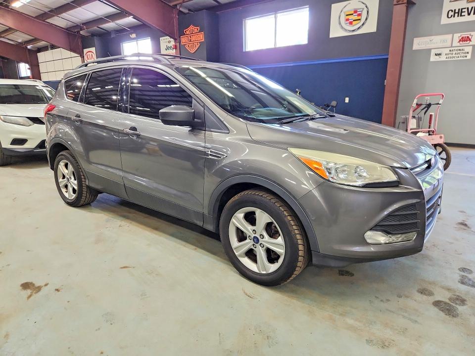 Photo 4 from auction – 2014 FORD ESCAPE with VIN 1FMCU9GXXEUD97852