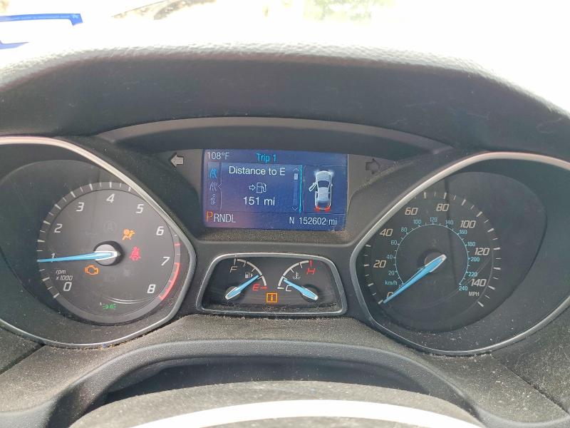 Photo 9 from auction – 2014 FORD FOCUS with VIN 1FADP3F2XEL443033