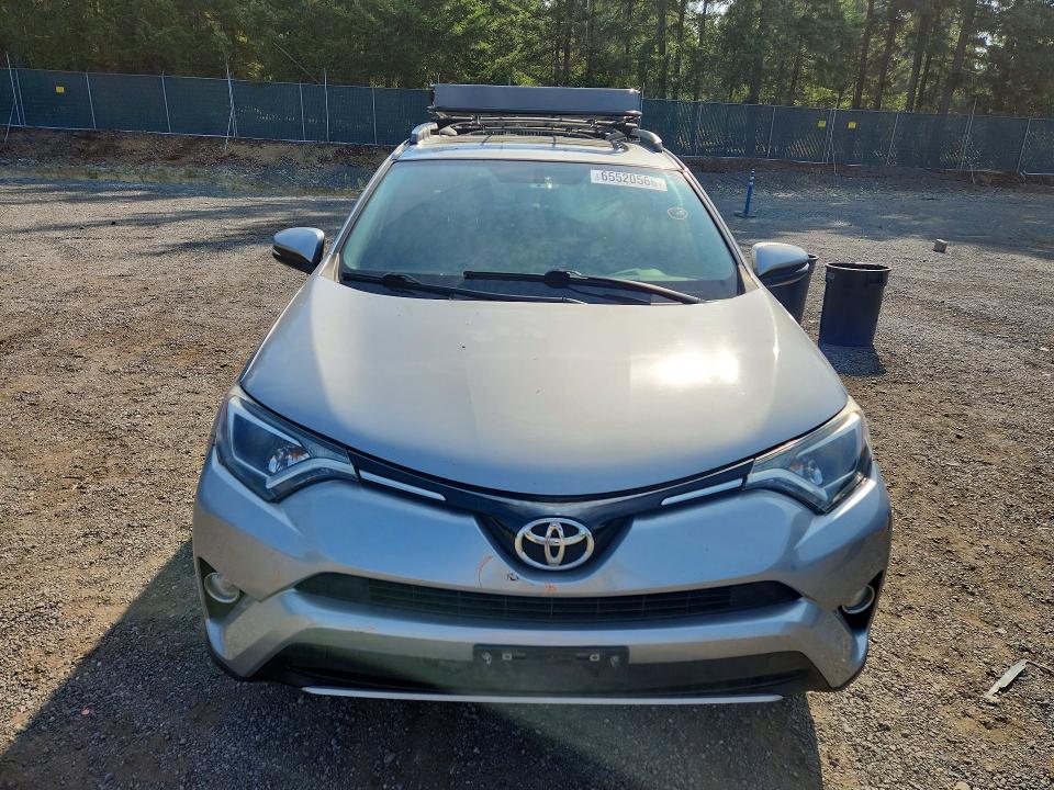 Photo 5 from auction – 2016 TOYOTA RAV4 with VIN 2T3RFREV1GW525847