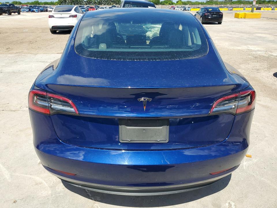 Photo 6 from auction – 2022 TESLA MODEL 3 with VIN 5YJ3E1EA2NF290305