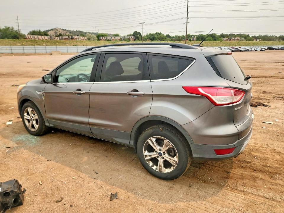 Photo 2 from auction – 2014 FORD ESCAPE with VIN 1FMCU9G9XEUC54062