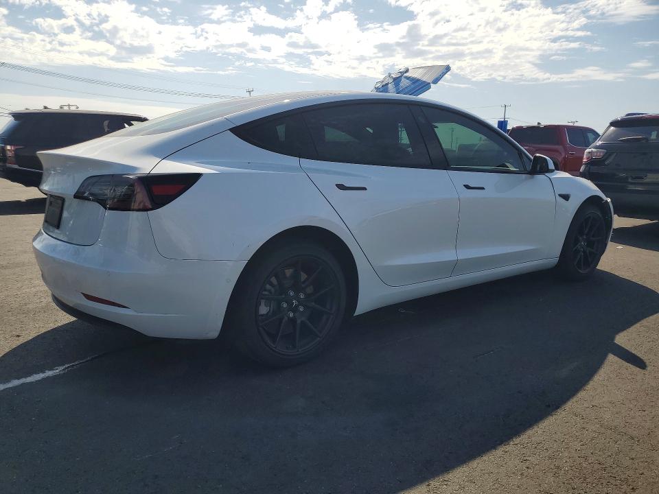 Photo 3 from auction – 2021 TESLA MODEL 3 with VIN 5YJ3E1EA4MF069044