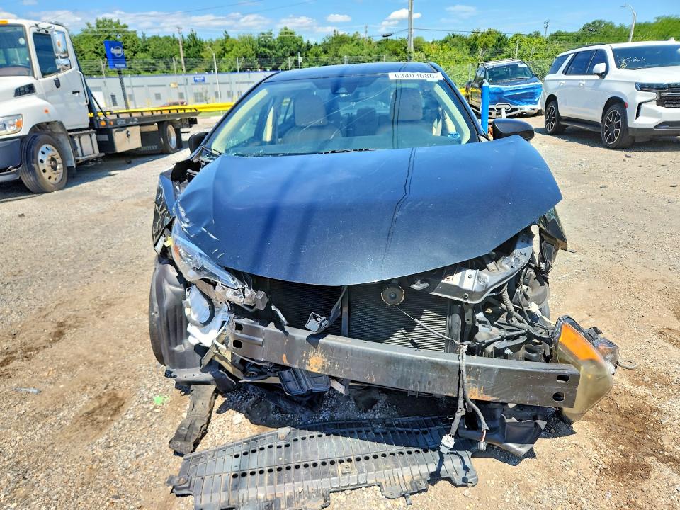 Photo 5 from auction – 2018 TOYOTA COROLLA with VIN 5YFBURHEXJP852347