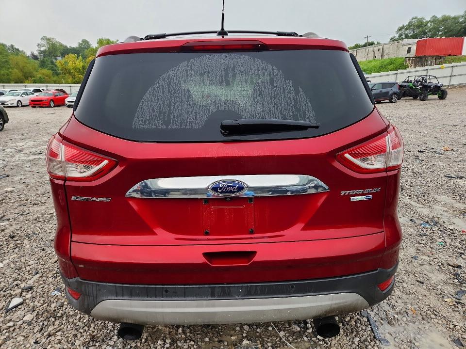 Photo 6 from auction – 2014 FORD ESCAPE with VIN 1FMCU9J99EUB13556