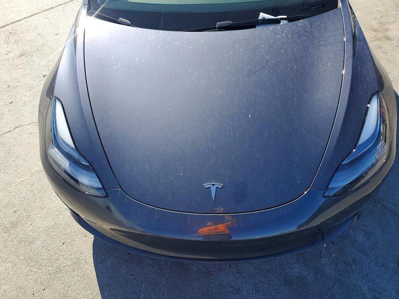 Снимка 11 от търг – 2023 TESLA MODEL 3 с VIN 5YJ3E1EA4PF624479