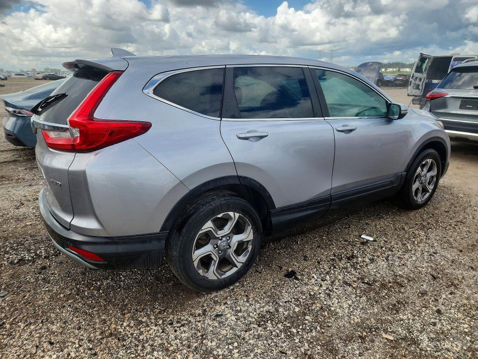 Photo 3 from auction – 2019 HONDA CR-V with VIN 5J6RW2H85KL037147