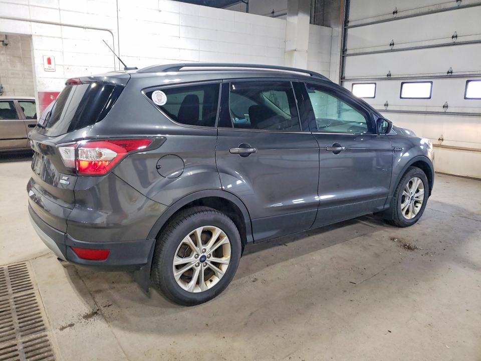 Photo 3 from auction – 2017 FORD ESCAPE with VIN 1FMCU9GD5HUA10361