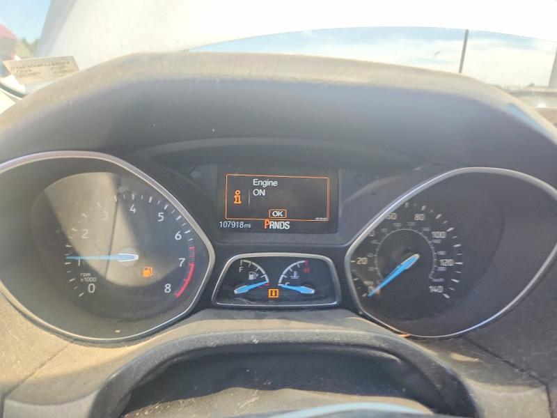 Photo 9 from auction – 2015 FORD FOCUS with VIN 1FADP3F20FL268017