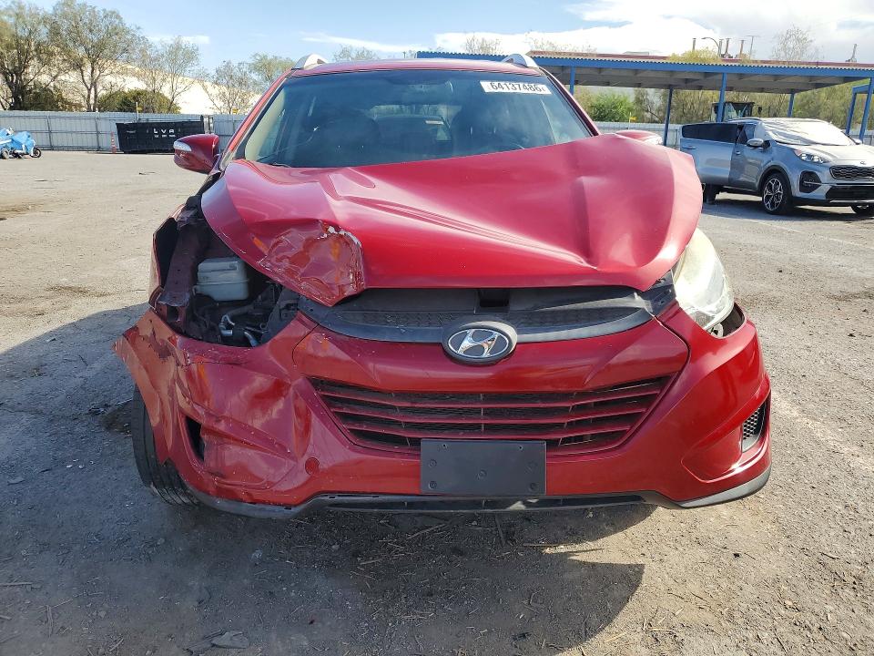 Photo 5 from auction – 2012 HYUNDAI TUCSON with VIN KM8JUCAC5CU511179