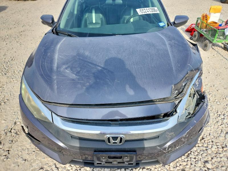 Photo 11 from auction – 2016 HONDA CIVIC with VIN 19XFC1F36GE000563