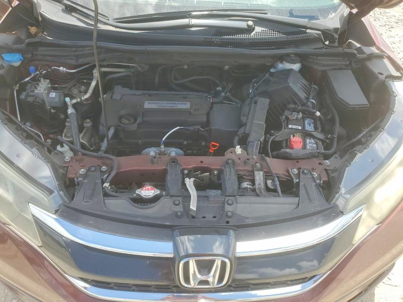 Photo 12 from auction – 2015 HONDA CR-V with VIN 3CZRM3H30FG700711