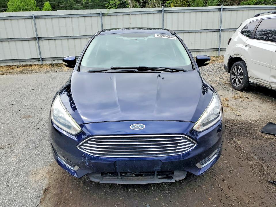 Photo 5 from auction – 2016 FORD FOCUS with VIN 1FADP3N24GL302639