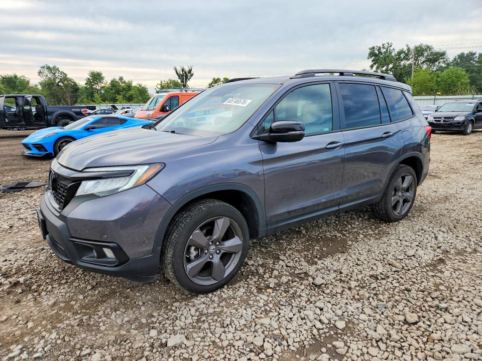 HONDA PASSPORT 2021 with VIN 5FNYF8H93MB010533 - Photo from auction
