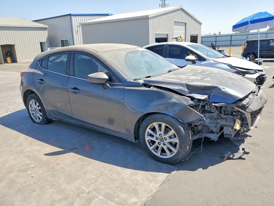 Photo 4 from auction – 2015 MAZDA 3 with VIN JM1BM1L79F1253705