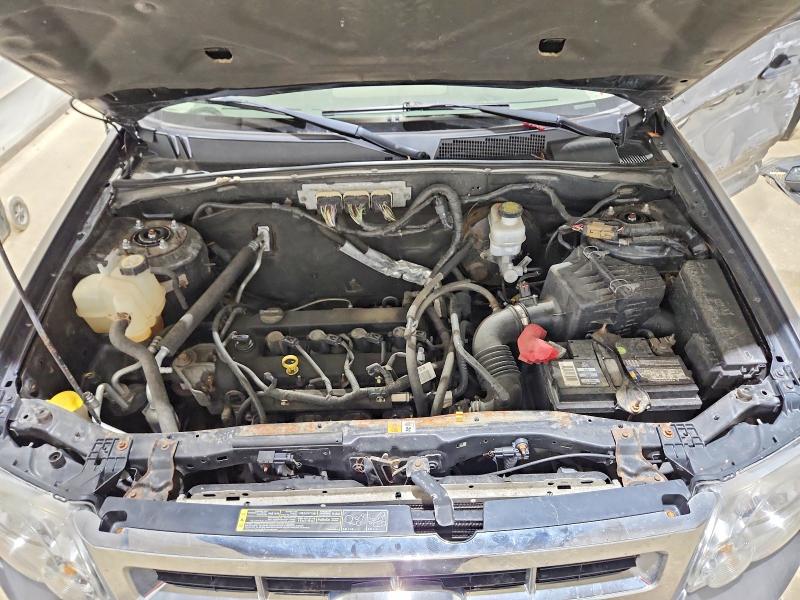 Photo 12 from auction – 2009 FORD ESCAPE with VIN 1FMCU92769KB27400