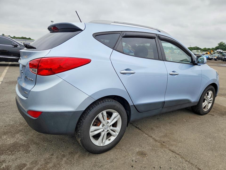 Photo 3 from auction – 2011 HYUNDAI TUCSON with VIN KM8JUCAC0BU200631