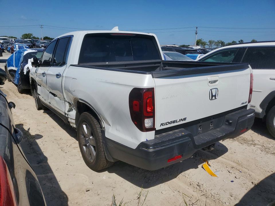 Photo 2 from auction – 2020 HONDA RIDGELINE with VIN 5FPYK3F74LB002527