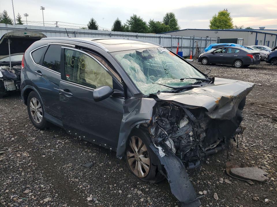 Photo 4 from auction – 2012 HONDA CR-V with VIN JHLRM4H77CC021471