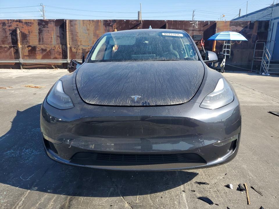 Photo 5 from auction – 2025 TESLA MODEL Y with VIN 7SAYGDED6SF259570