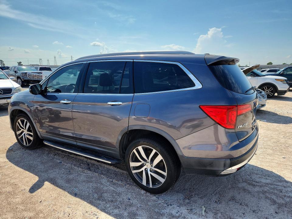 Photo 2 from auction – 2017 HONDA PILOT with VIN 5FNYF6H92HB041170