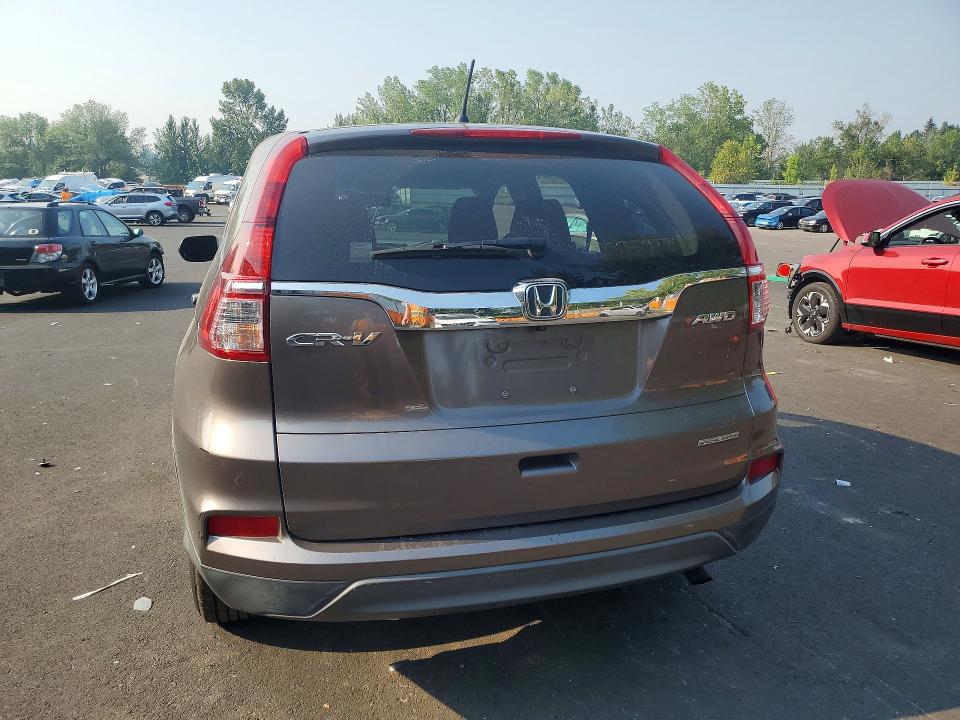 Photo 6 from auction – 2016 HONDA CR-V with VIN 5J6RM4H41GL100136