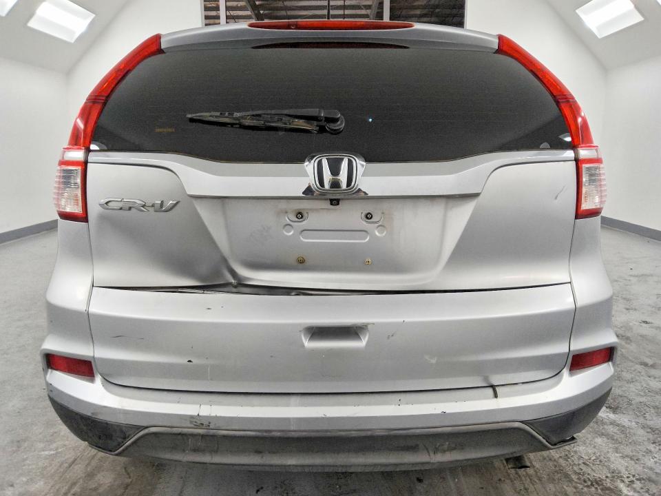 Photo 6 from auction – 2016 HONDA CR-V with VIN 2HKRM3H36GH520857