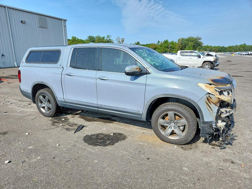 Photo 4 from auction – 2022 HONDA RIDGELINE with VIN 5FPYK3F72NB020527