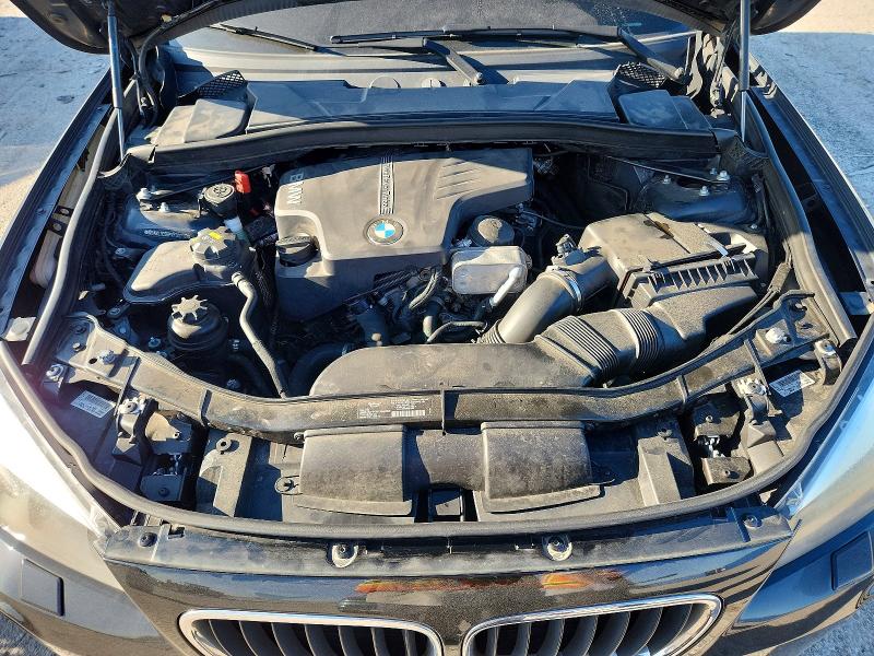 Photo 11 from auction – 2015 BMW X1 with VIN WBAVL1C55FVY30718