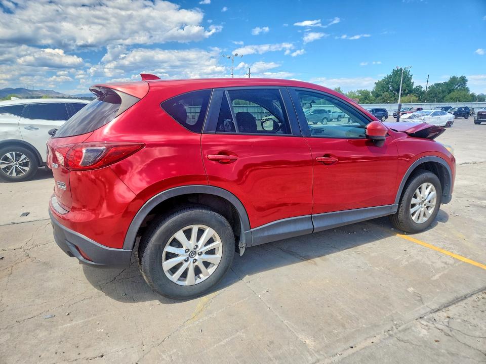 Снимка 3 от търг – 2014 MAZDA CX-5 с VIN JM3KE2CY5E0389272