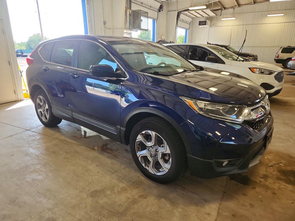 Photo 4 from auction – 2019 HONDA CR-V with VIN 7FARW2H59KE034741