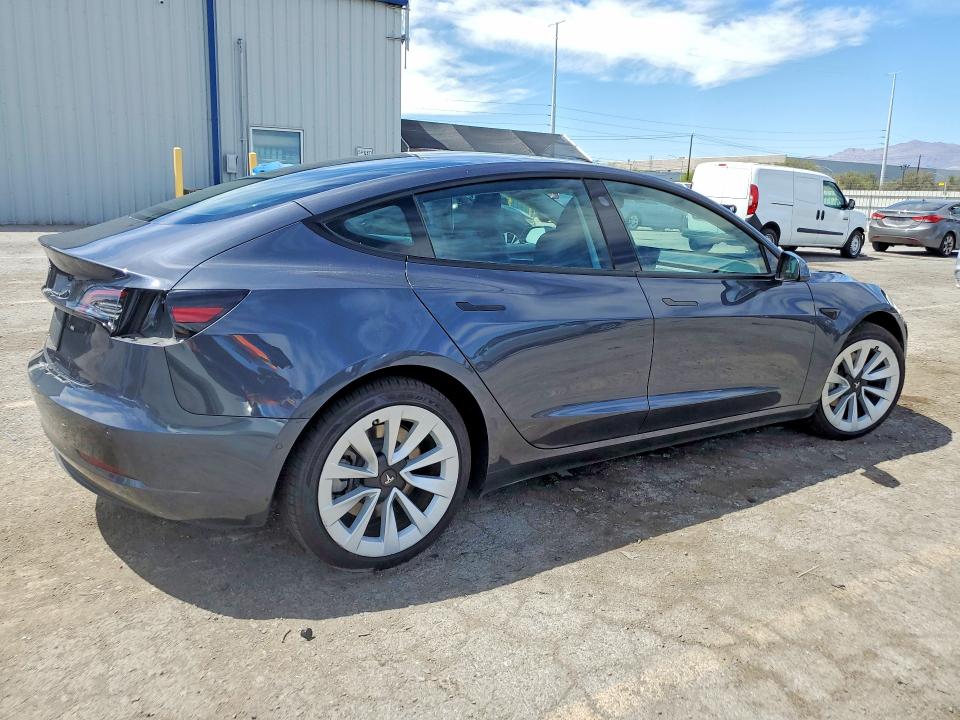 Photo 3 from auction – 2021 TESLA MODEL 3 with VIN 5YJ3E1EA0MF072085