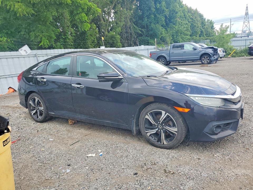 Photo 4 from auction – 2016 HONDA CIVIC with VIN 2HGFC1F95GH101135