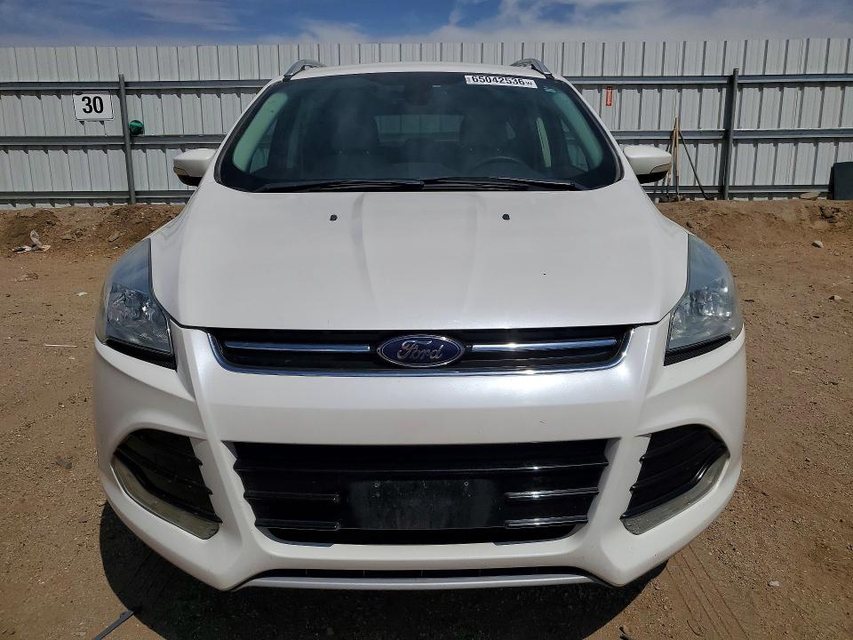 Photo 5 from auction – 2016 FORD ESCAPE with VIN 1FMCU0J99GUC59714