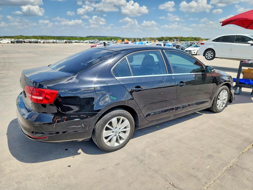 Photo 3 from auction – 2015 VOLKSWAGEN JETTA with VIN 3VWD07AJ9FM253189