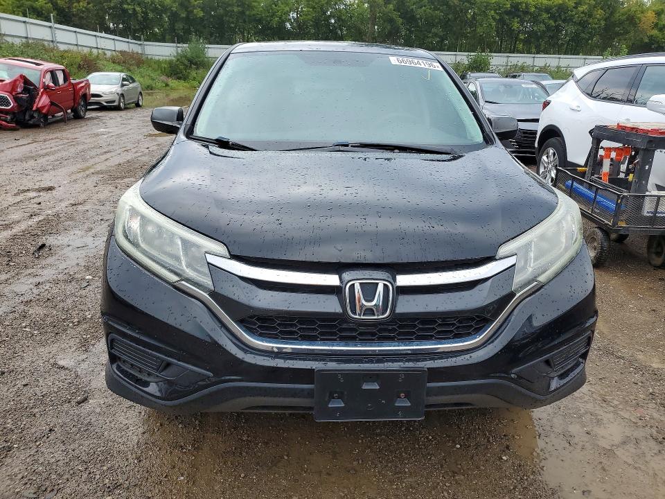 Photo 5 from auction – 2015 HONDA CR-V with VIN 5J6RM4H39FL123511