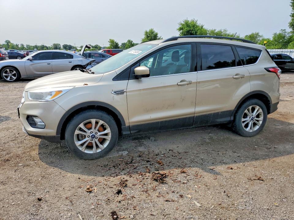FORD ESCAPE 2018 with VIN 1FMCU9GD4JUA32860 - Photo from auction