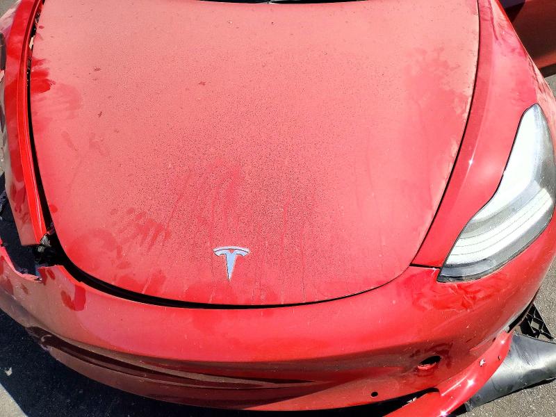 Photo 11 from auction – 2022 TESLA MODEL 3 with VIN 5YJ3E1EC7NF233809