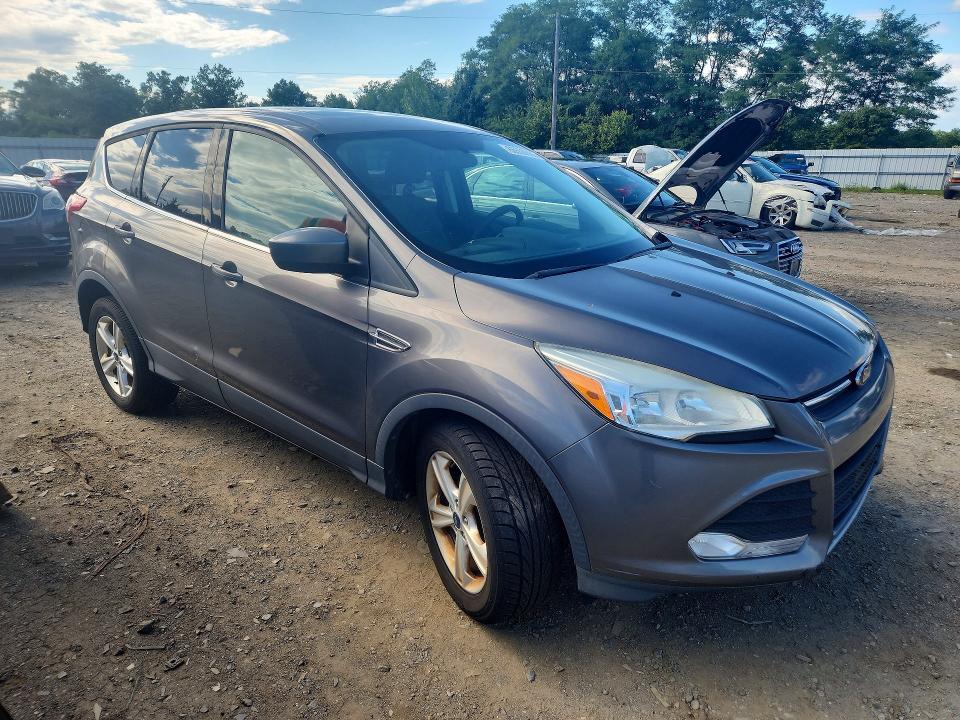 Photo 4 from auction – 2014 FORD ESCAPE with VIN 1FMCU0GX8EUA49771