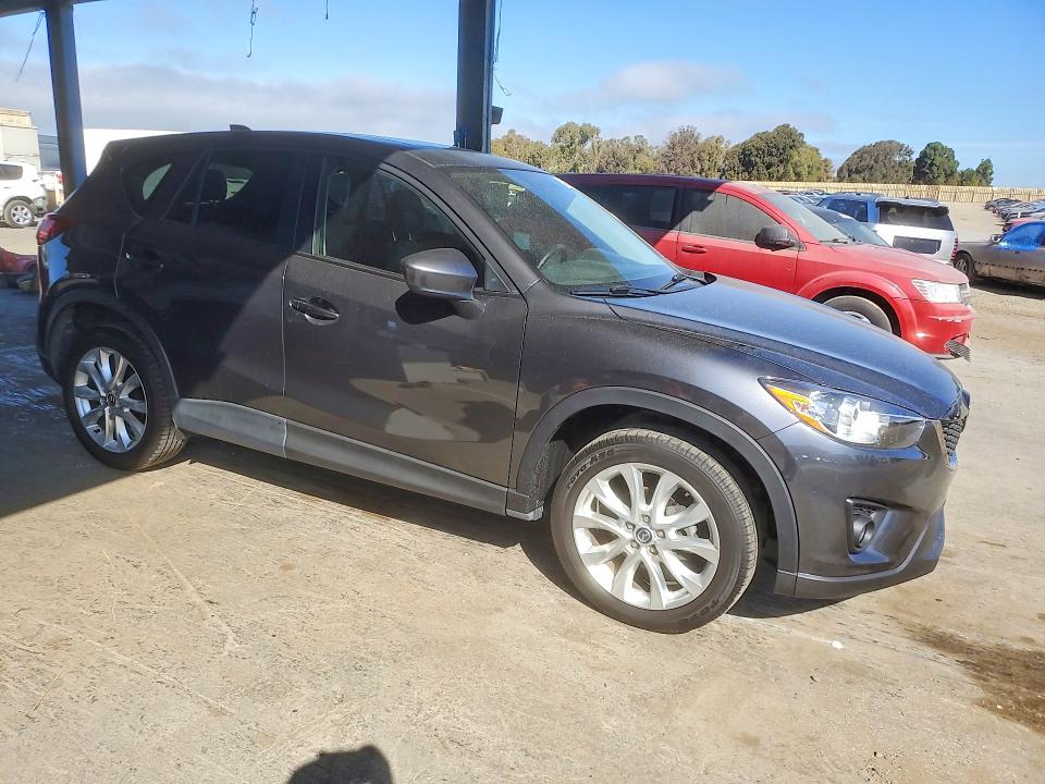 Photo 4 from auction – 2014 MAZDA CX-5 with VIN JM3KE4DY2E0309890