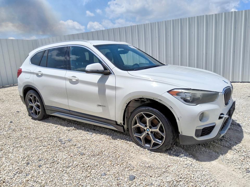 Photo 4 from auction – 2016 BMW X1 with VIN WBXHT3C39G5E52744