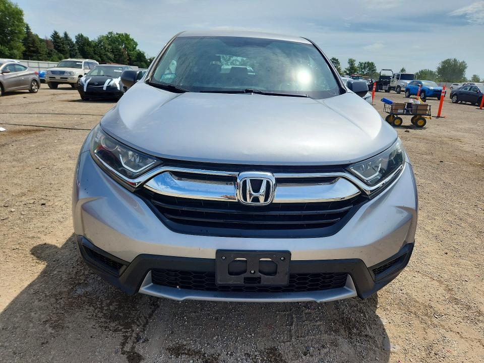 Photo 5 from auction – 2019 HONDA CR-V with VIN 2HKRW6H38KH208611