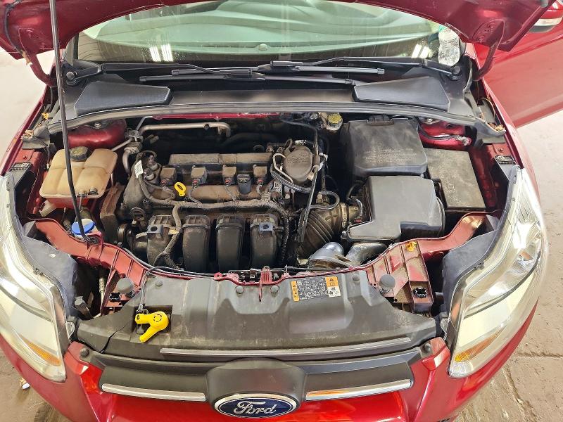 Photo 11 from auction – 2014 FORD FOCUS with VIN 1FADP3F29EL439460